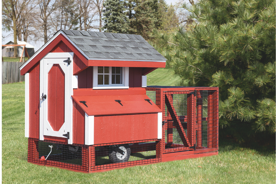 red and white trimmed tractor chicken coop with attached run and wheels in Little Rock AR