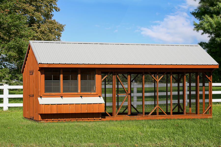 wooden combination chicken coops for sale in Fayetteville AR with gray metal roofing and lid on egg collection box