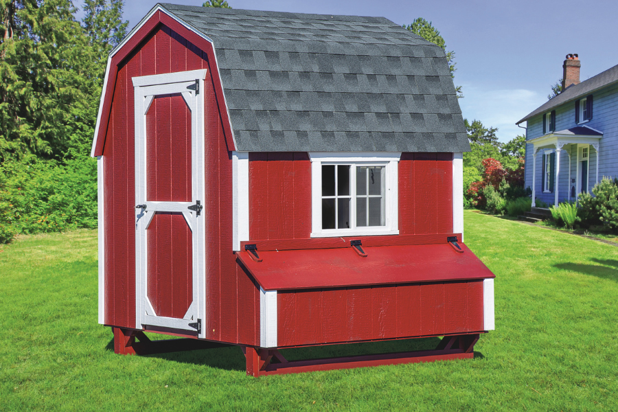 red and white trimmed dutch coop with gray shingle roof and side egg collection box