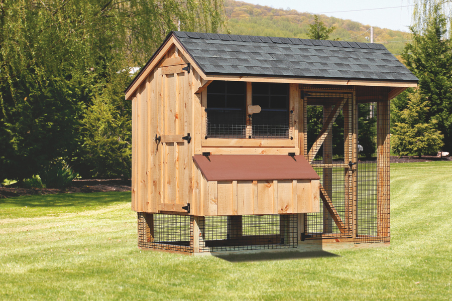 wooden combination chicken coops in Idaho with brown lid on egg collection box and gray shingle roof