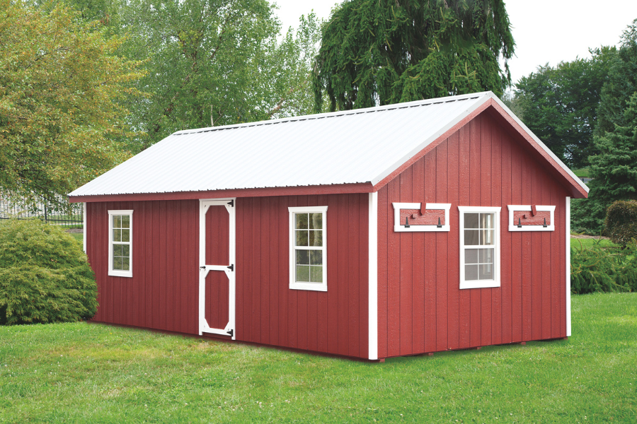 red a frame chicken coops with white trim and metal roof
