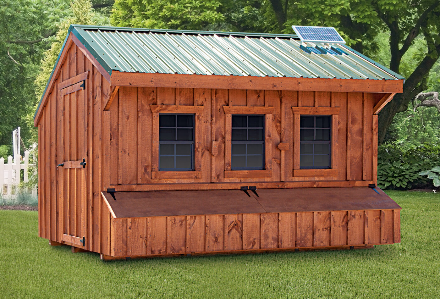 wooden quaker chicken coops for sale in Columbia MD with green metal roof solar panels three windows with egg collection boxes below them and a side door