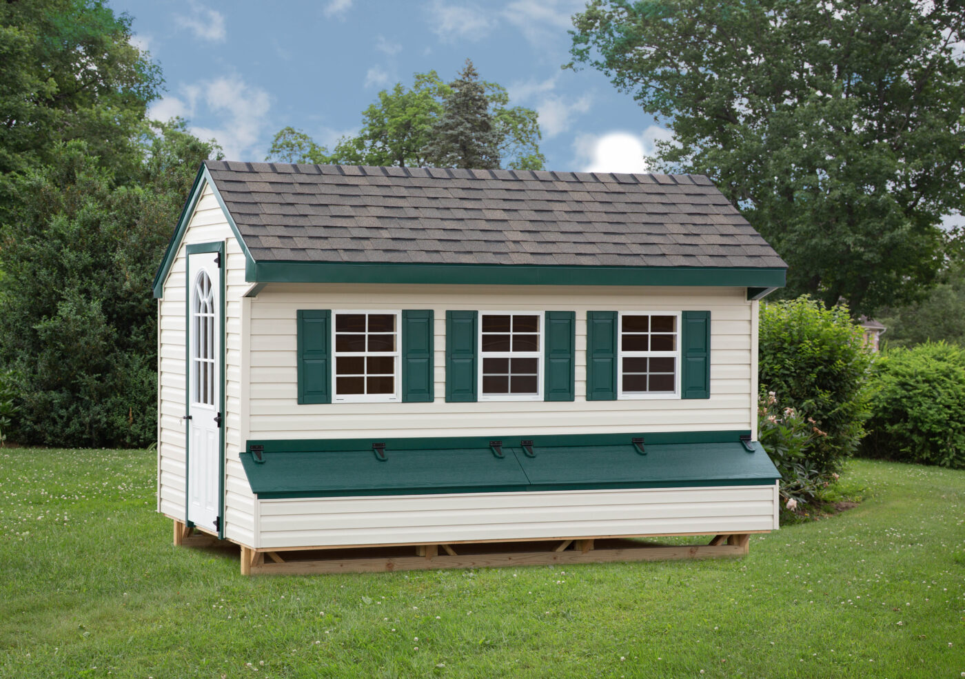 white and green chicken coops for sale in Germantown MD with three windows with green shutters