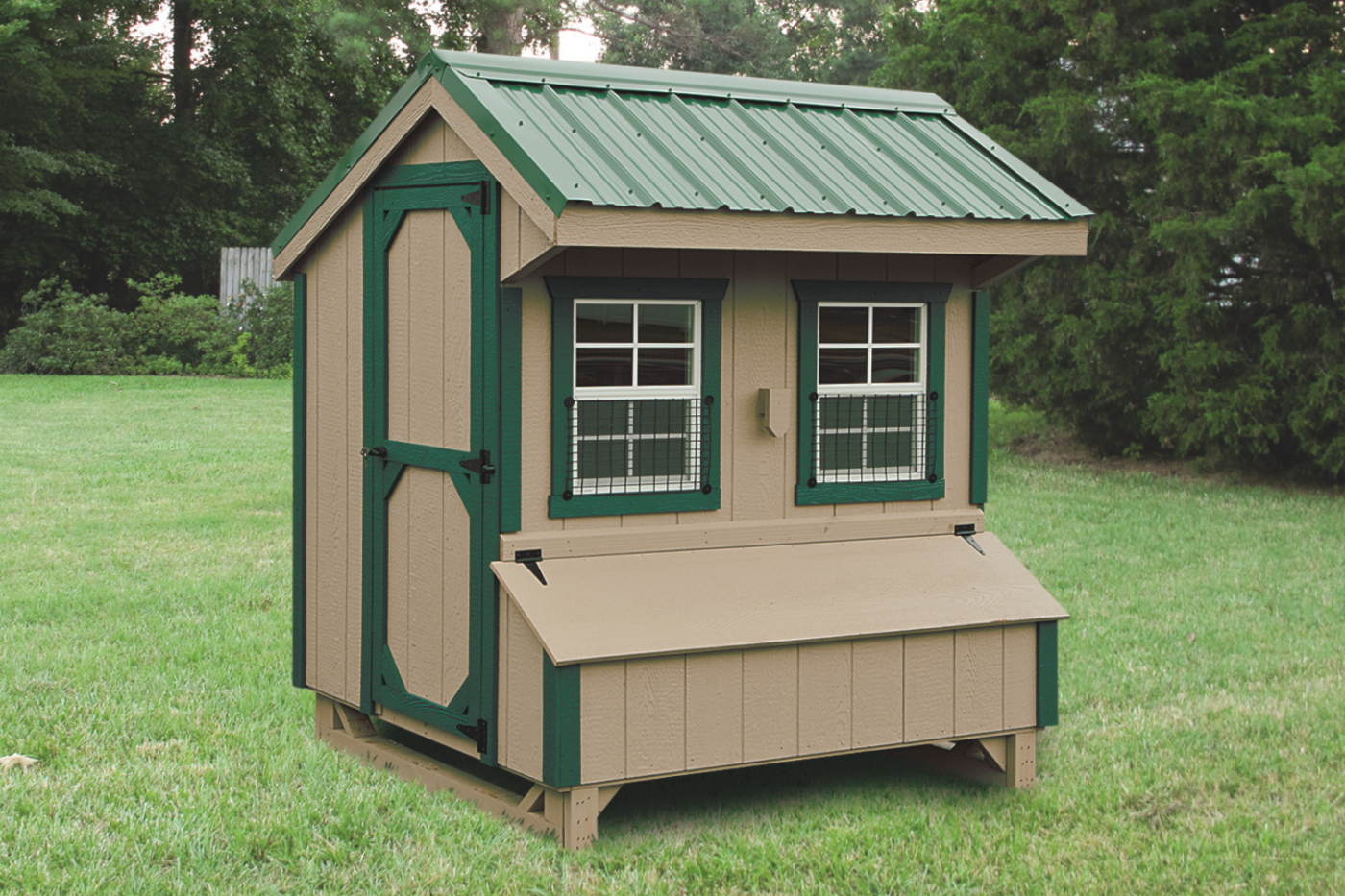 beige quaker chicken coop with green siding in missoula mt