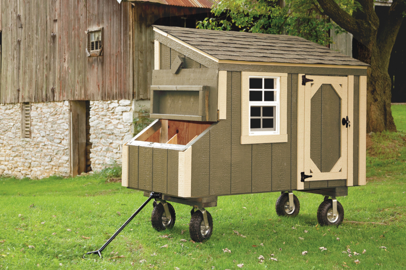 green lean to chicken coop with wheels in montana