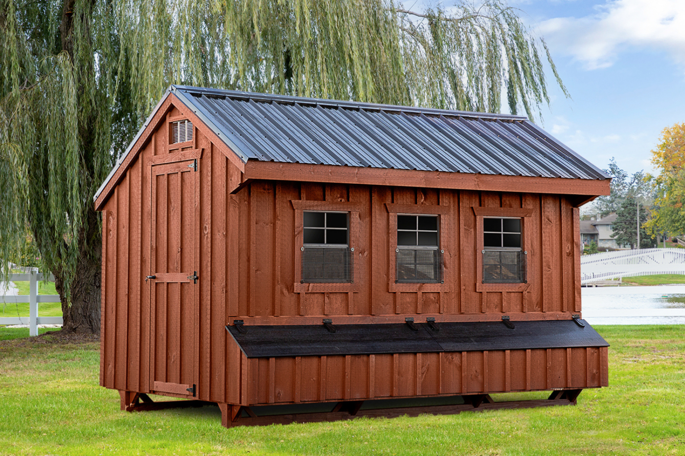 brown and black quaker chicken coop with windows in montana