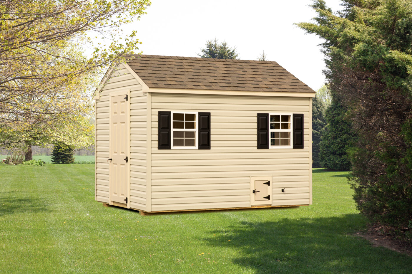 tan vinyl a frame coop with two windows with black shutters