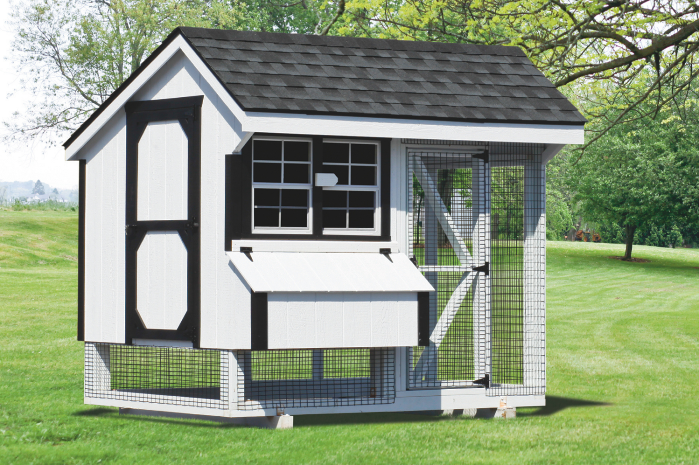 white and black combination chicken coop with windows in eugene or