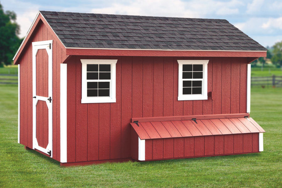 red and white trimmed quaker coop with shingle roof and egg collection box