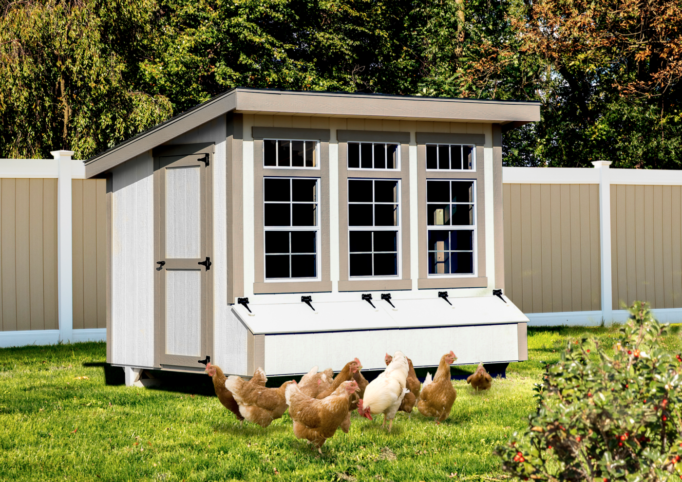 A Modern Lean-To Chicken coop with white siding and tan trim in Utah near Salt Lake City.