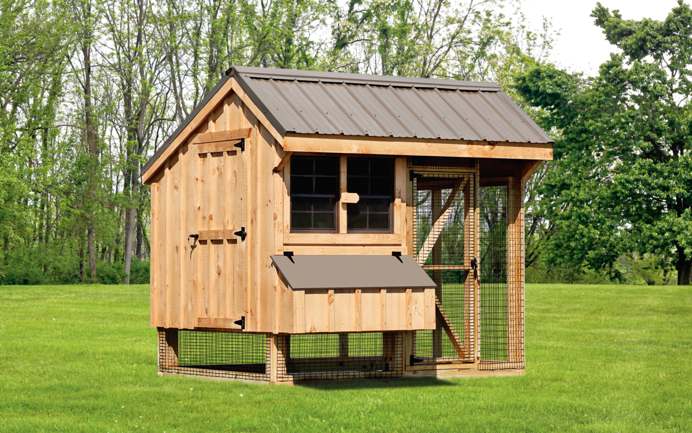 A board and batt siding chicken coop with brown roof and a run available in West Valley City, UT.