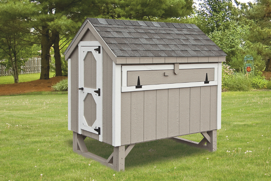 tan a farme chicken coops for sale in Charleston WV with white trim and shingle roof