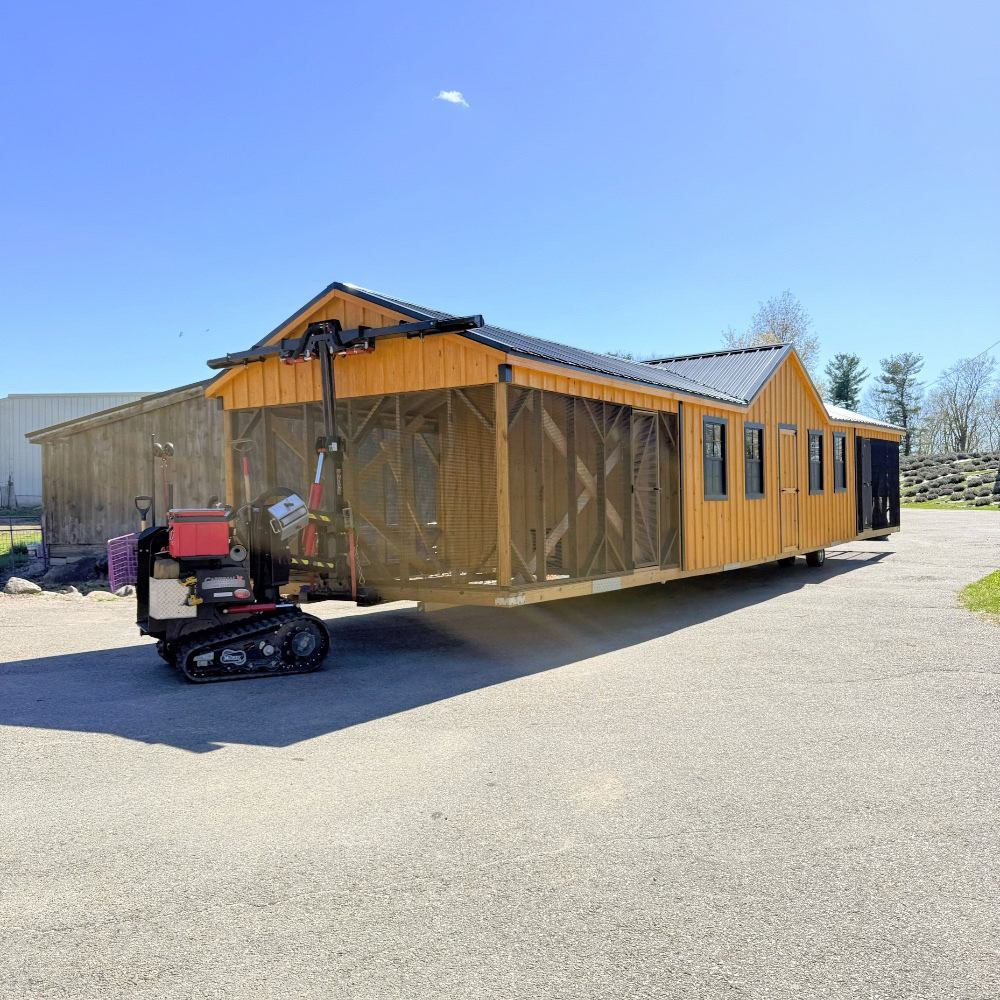 Shed mule placing 12x50 A Frame Double Combination Coop in Jefferson MA 1789