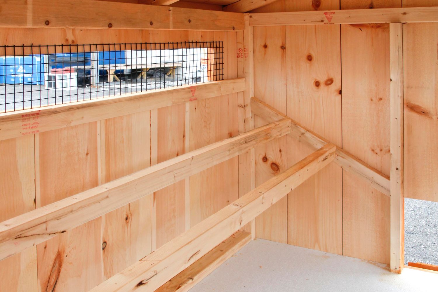 roosting bars inside a chicken coop