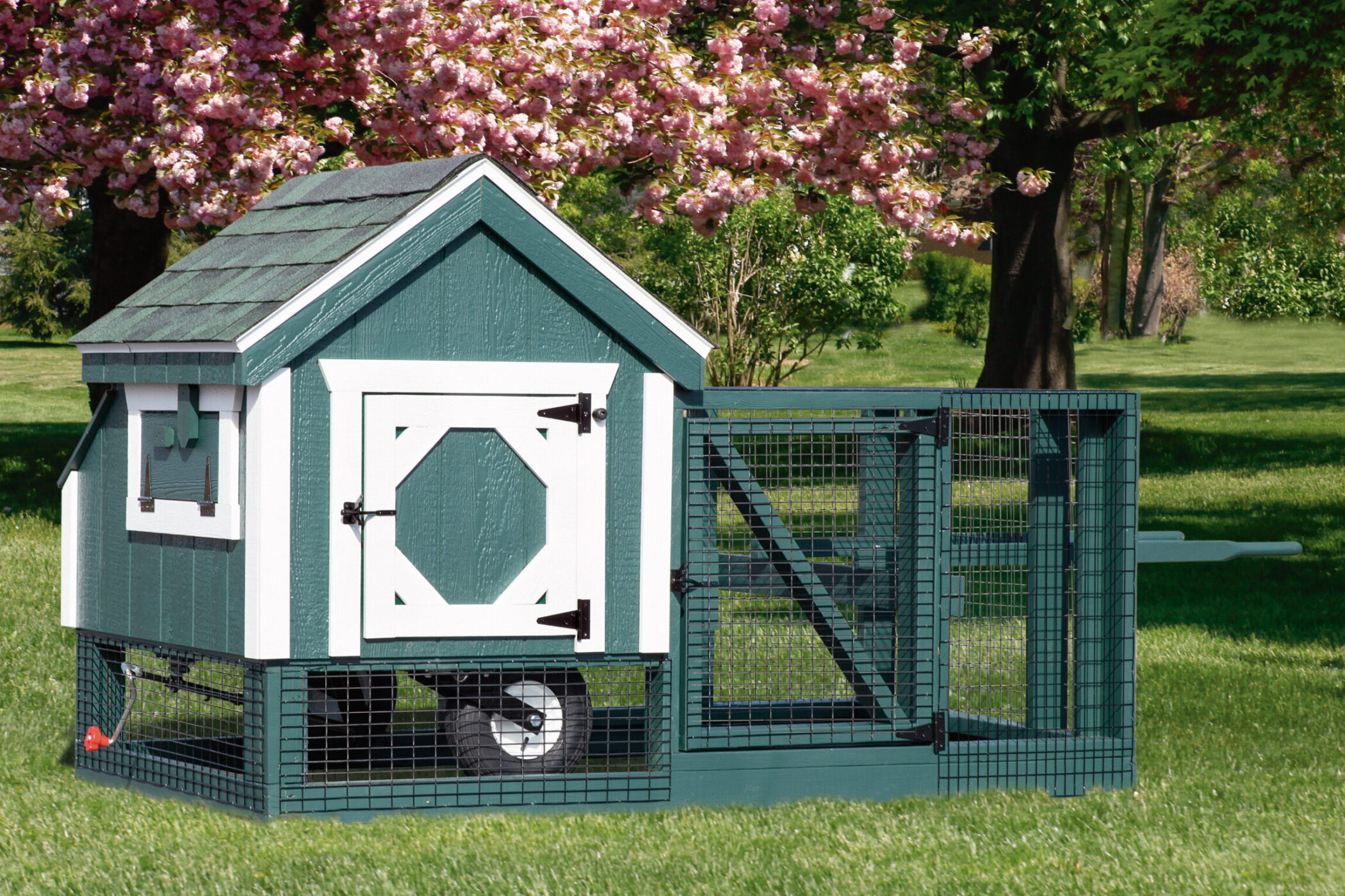 green and white trimmed tractor coop with run