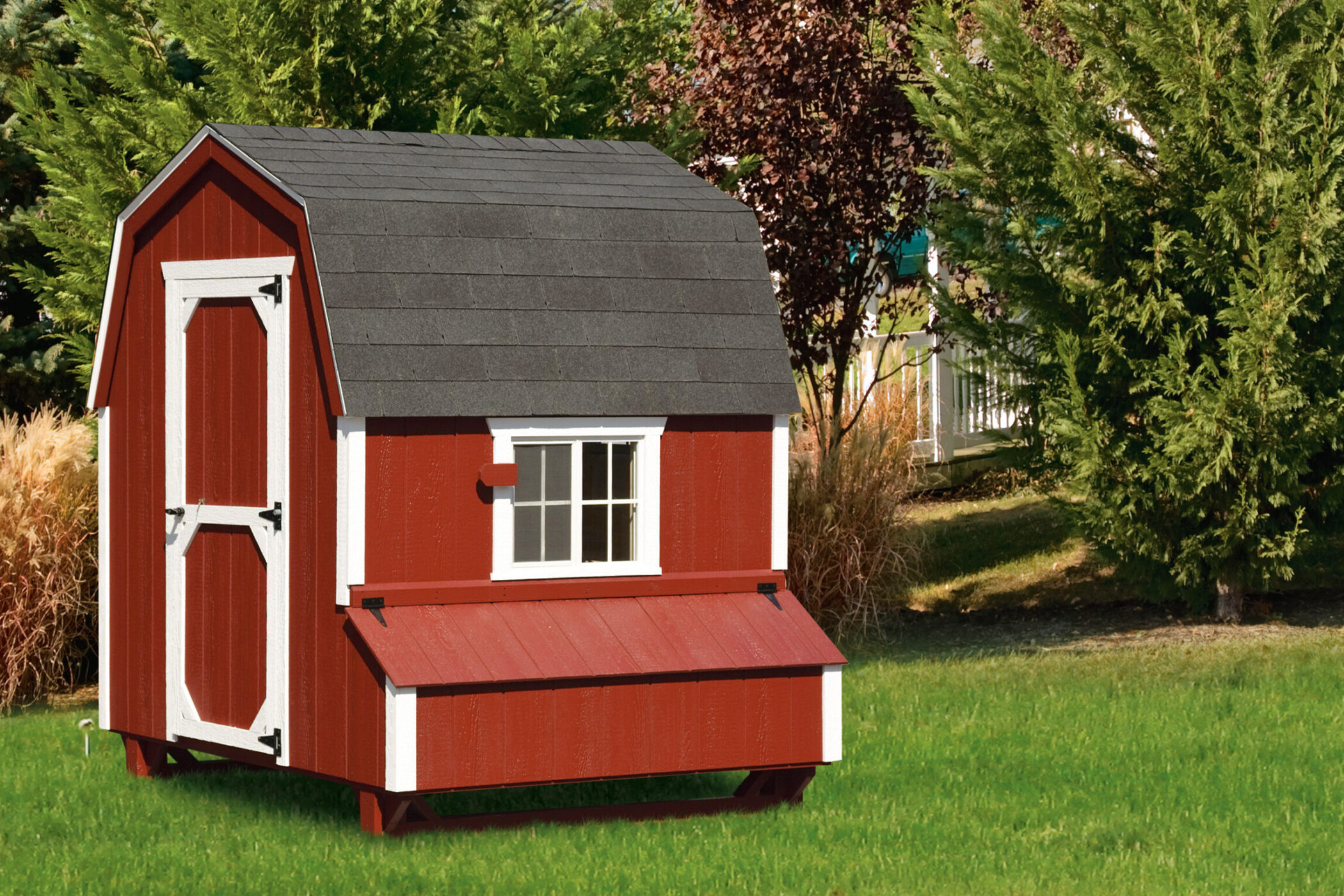 red dutch chicken coops in Maryland with white trim and shingle roof