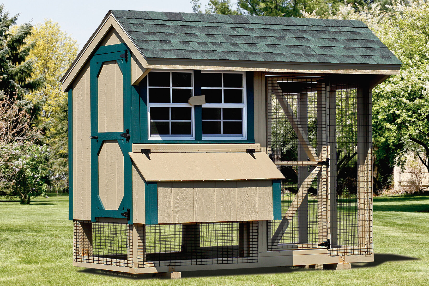 tan combination coop with green trim and outdoor run