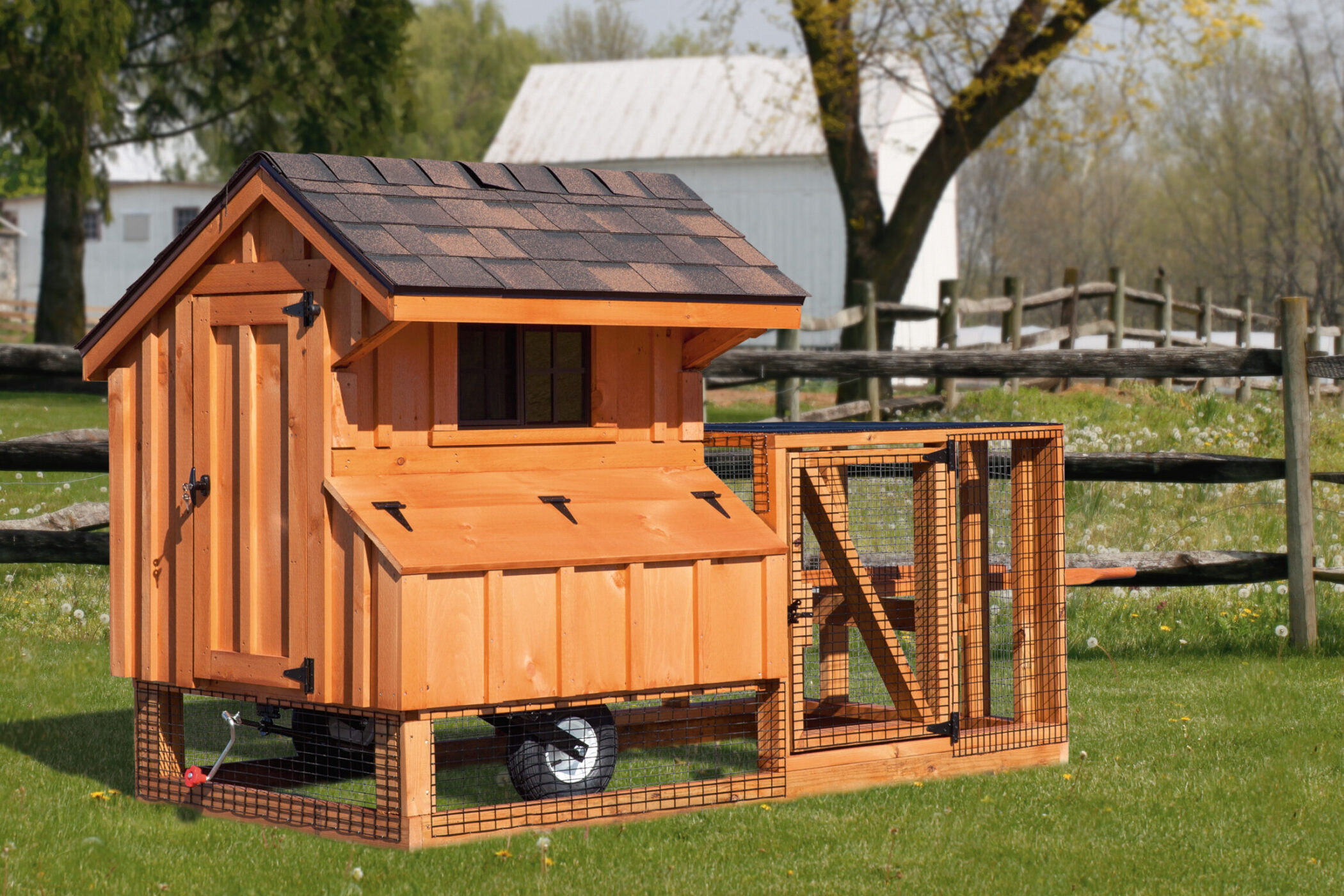 wooden tractor chicken coop with run wheels and shingle roof