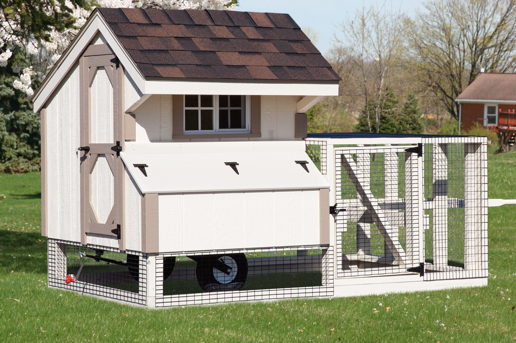 white tractor coop with tan trim